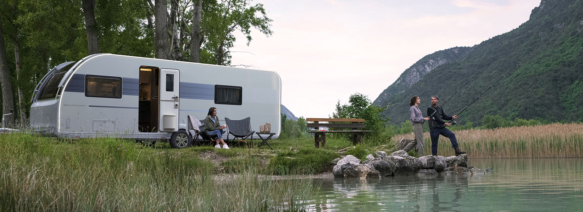Adria Alpina Caravan parked outside in a scenic location
