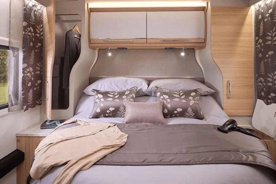 Alicanto Grande Lisbon king-sized fixed island bed providing ultimate comfort and luxury in a caravan bedroom setting