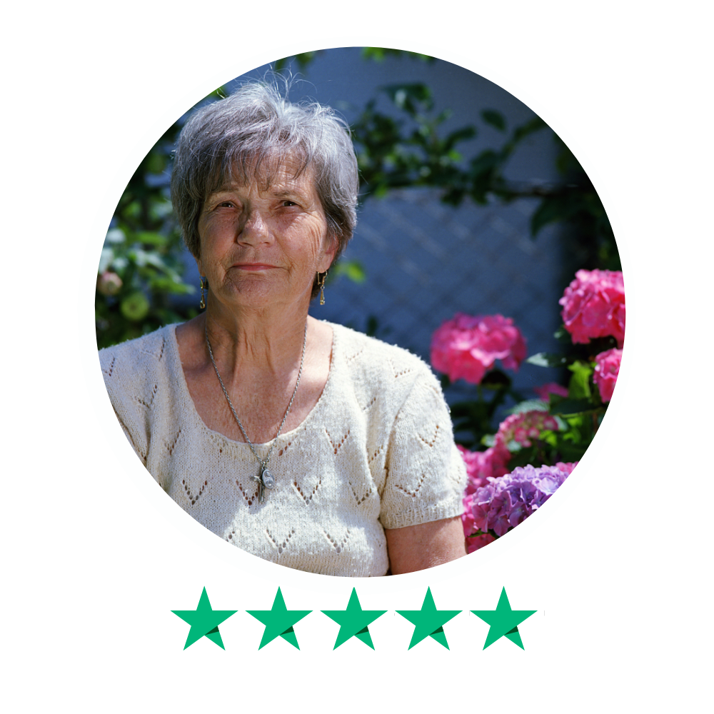 Customer photo with 5-star Trustpilot rating. Review mentions bespoke mattress toppers for Basecamp 6 caravan, helpful online chat, and excellent communication.