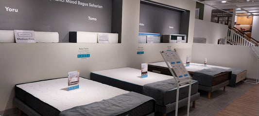 a display of mattresses in a store