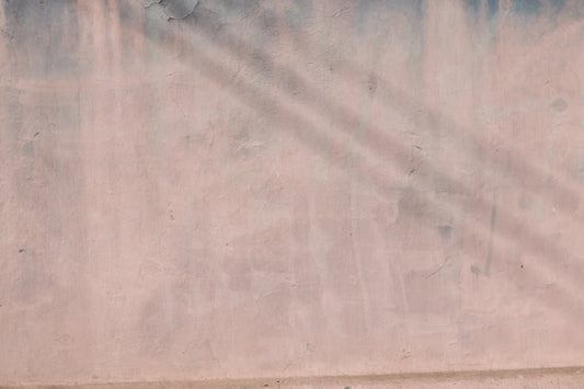 Soft, washed-out texture with diagonal shadows.