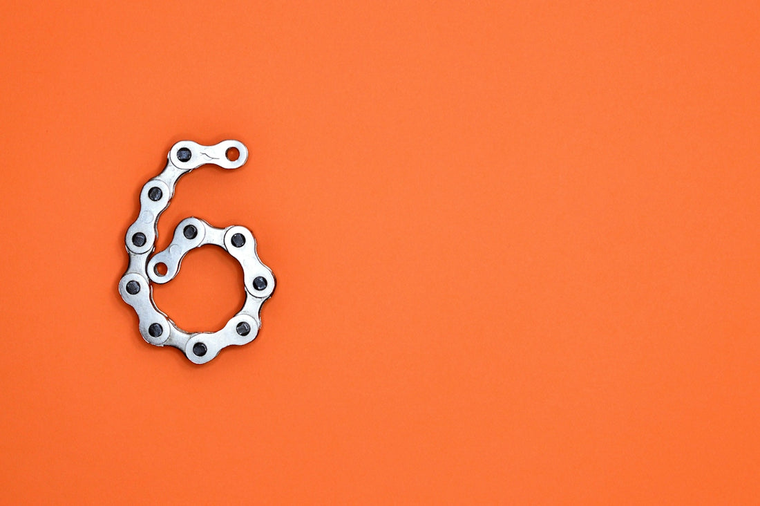 A bike chain forms the number six