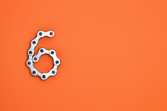 A bike chain forms the number six