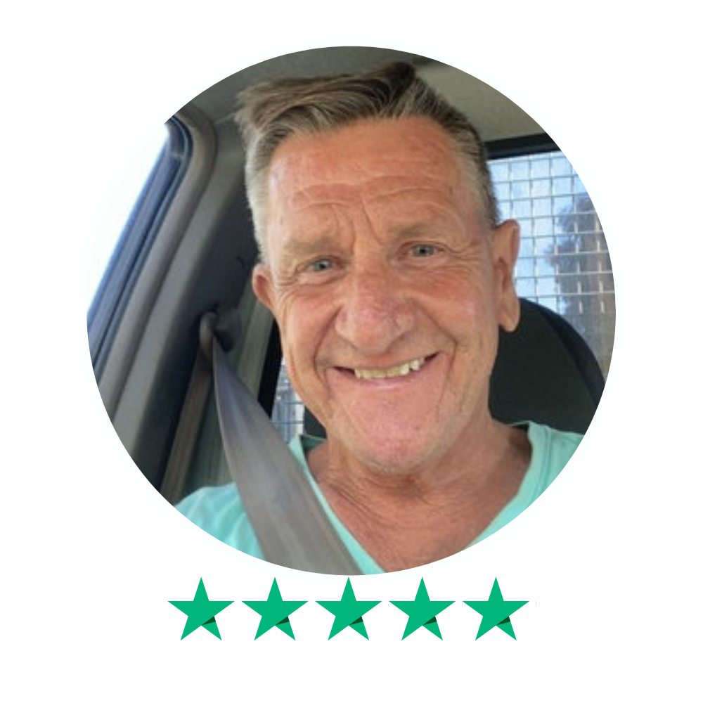 Customer photo with 5-star Trustpilot rating. Review praises mattress made to exact specifications and early delivery.