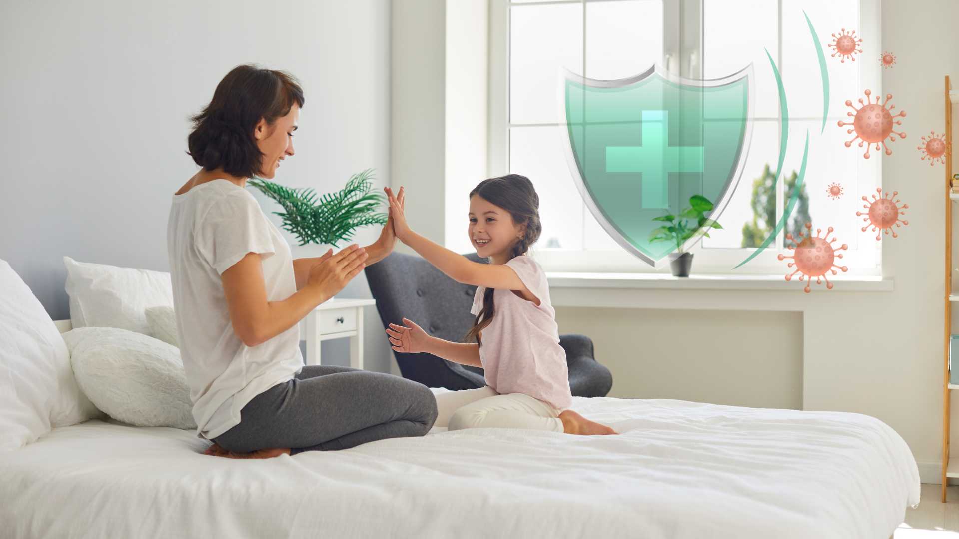 A mother and daughter enjoy a safe and hygienic sleep environment thanks to Viroclean's protective shield technology.