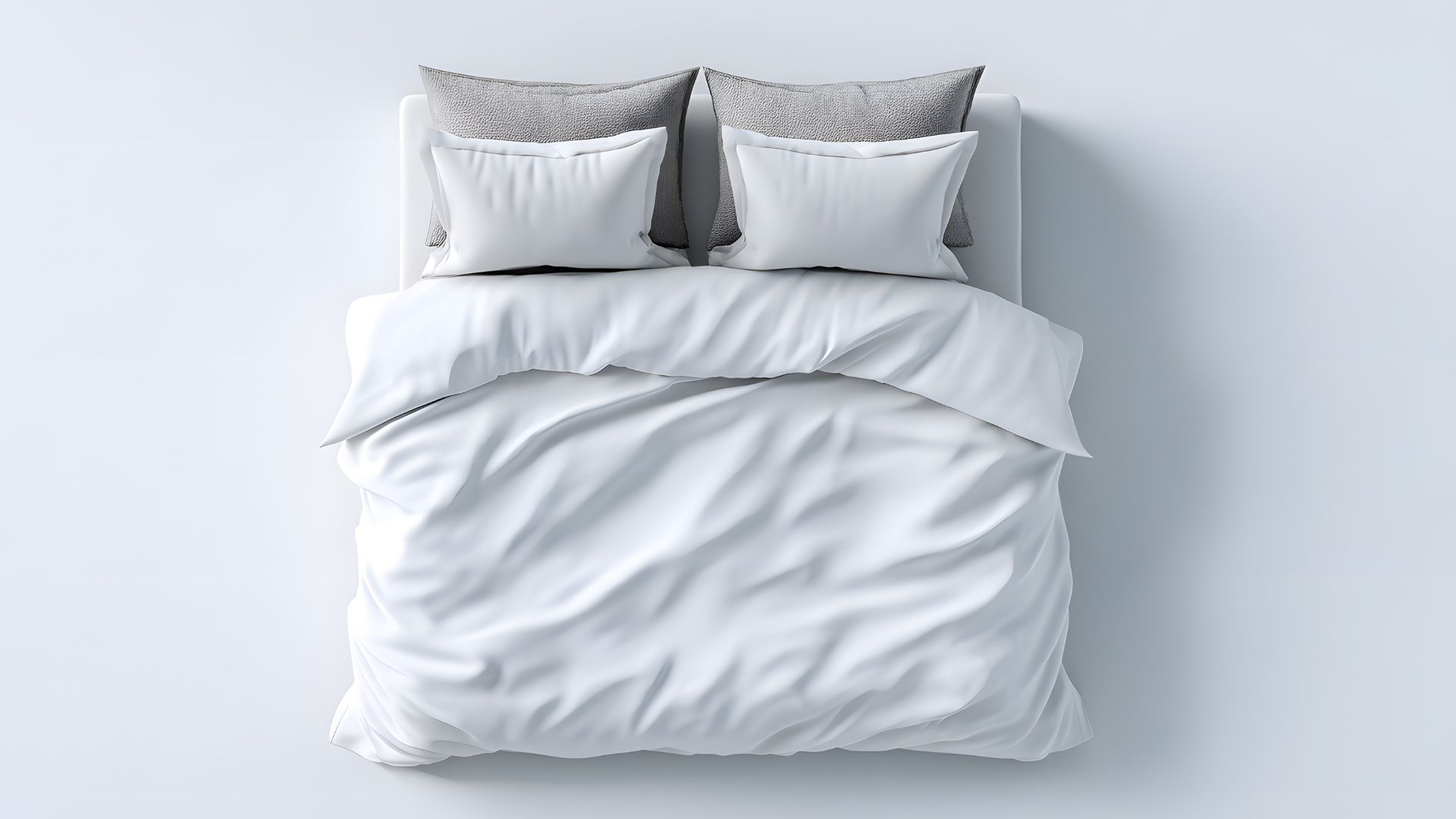 Image: White bedding set with bespoke mattress and grey bespoke headboard on a light grey background