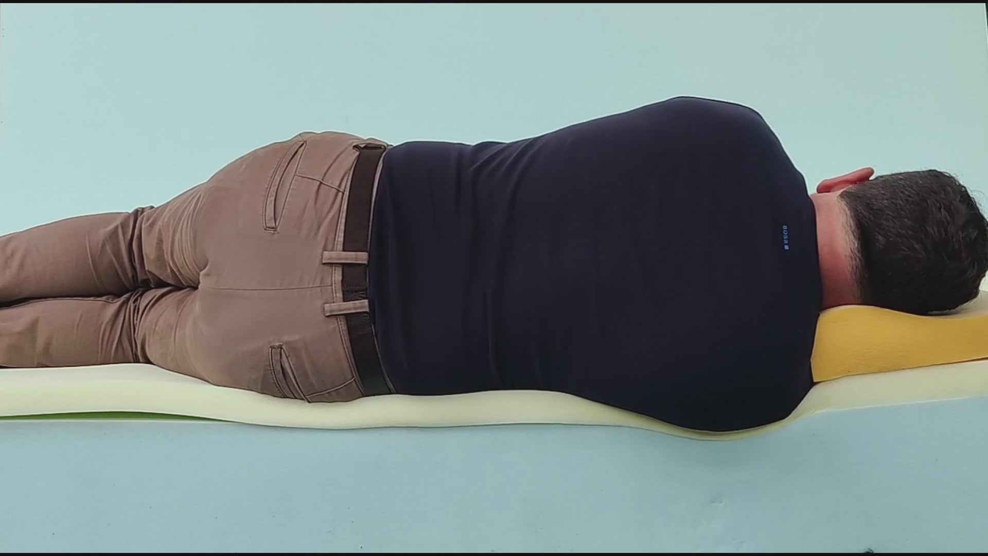 Load video: Video featuring a staff member lying down on a Memory Foam Mattress, providing a real-world demonstration of the foam&#39;s contouring properties and offering insight into the user experience.