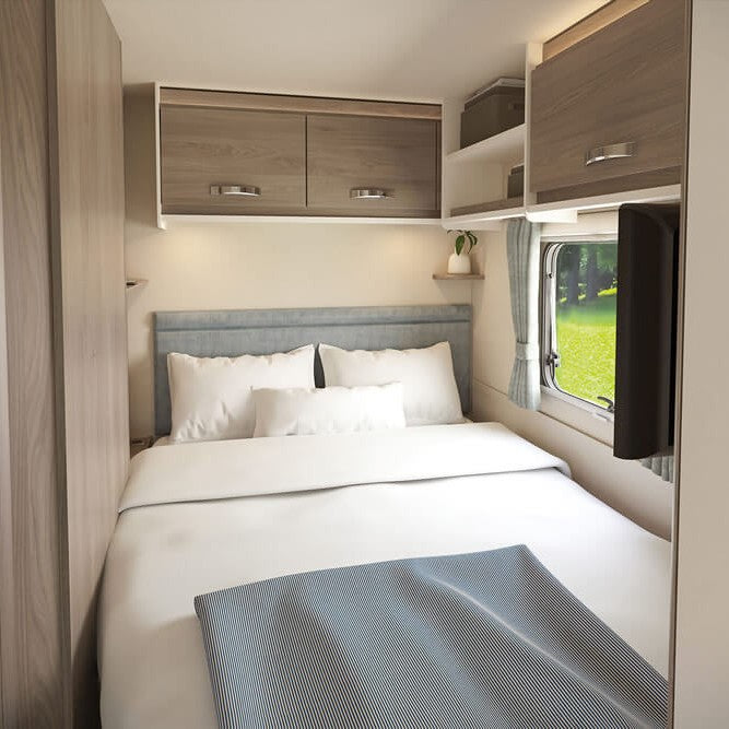 Sprite Grande Quattro FB bedroom elegantly furnished with a made-to-measure mattress, highlighting the custom fit and comfort.